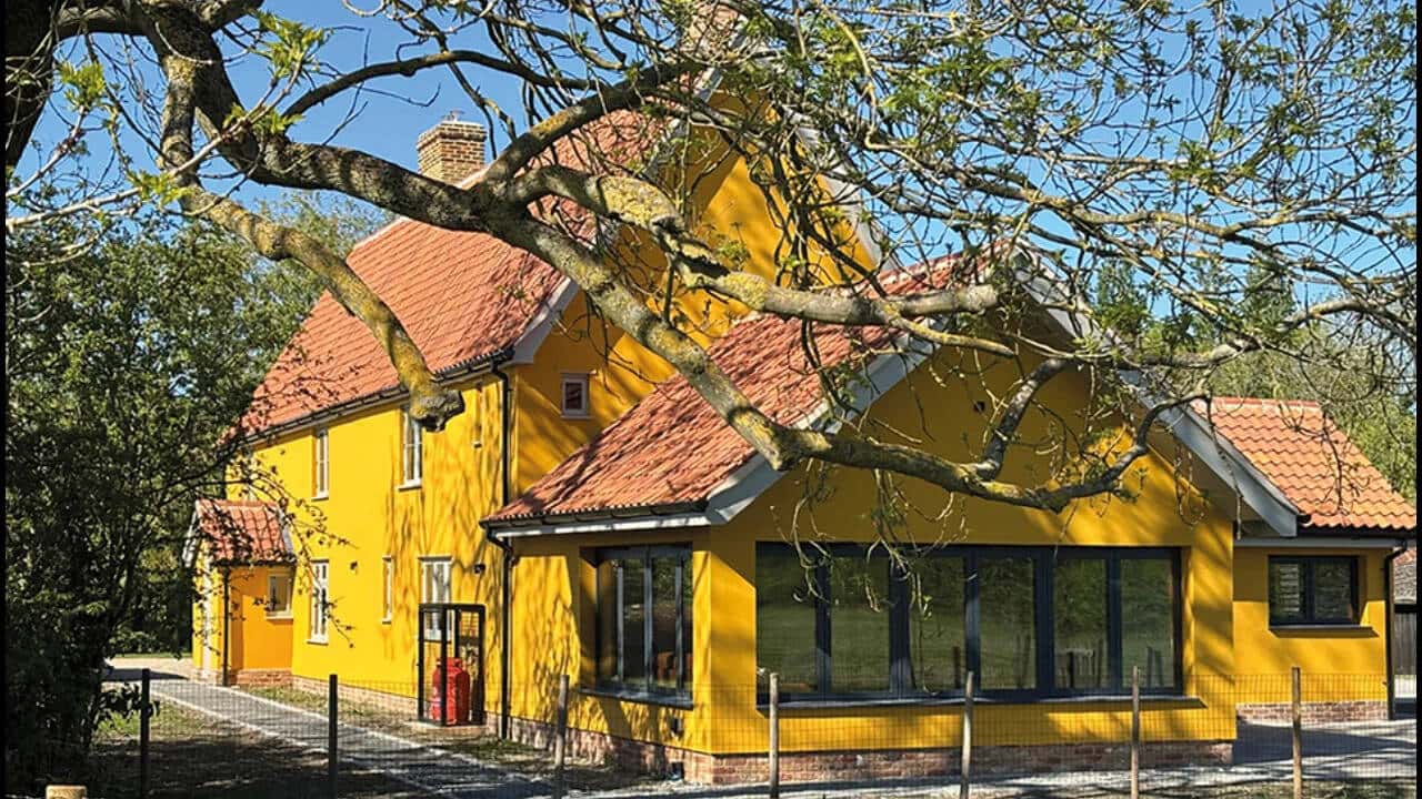 16th-Century Longhouse Restoration Transforms into Family Home