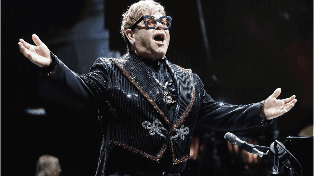 Elton John's Motivational Quote: 'Never Give Up' on Life's Challenges